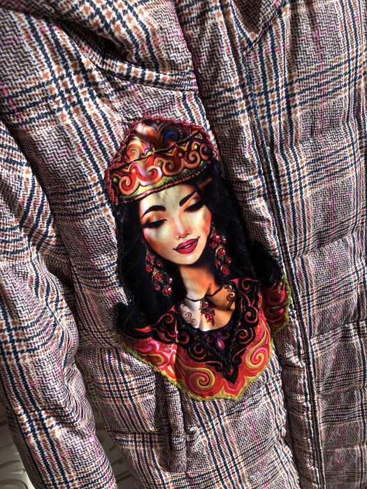 Женил Пуховик