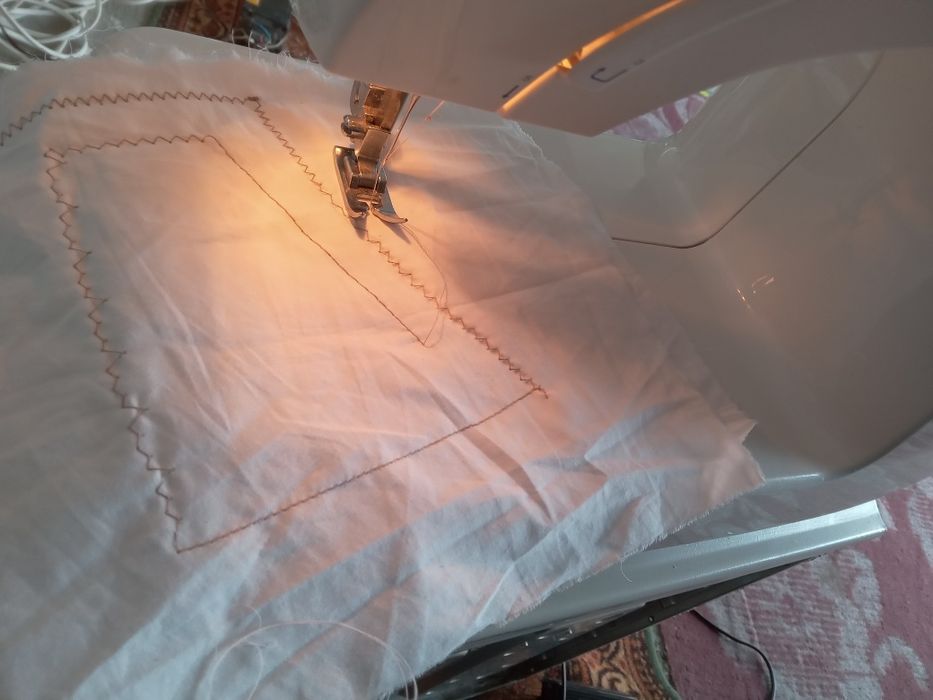 Masina de cusut Singer