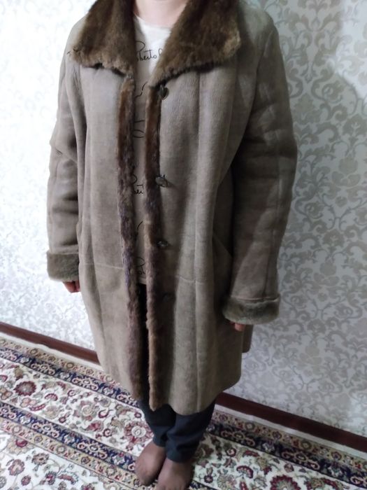 Тёплая женская дубленка