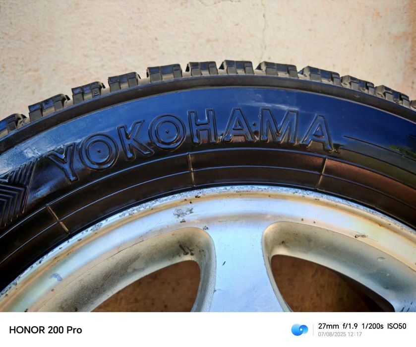 Продам диски с резиной на шипах на Субару