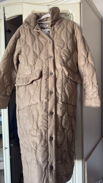 Новая куртка с этикеткой