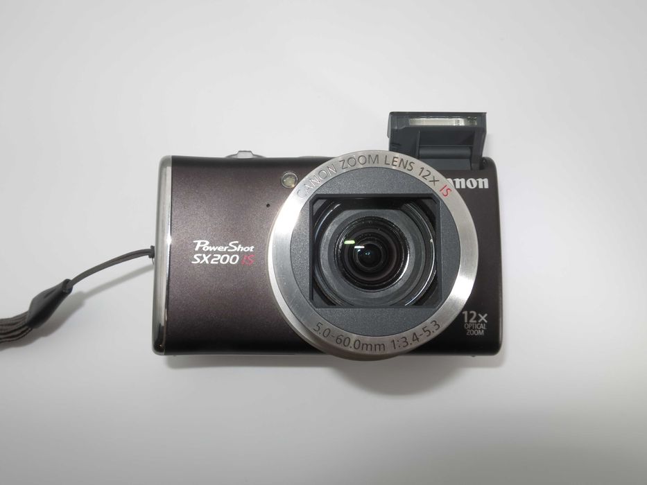 Canon SX200 ултра компактен цифров фотоапарат, дигитална камера с голям оптичен зуум, като НОВА - пълен комплект - работи отлично