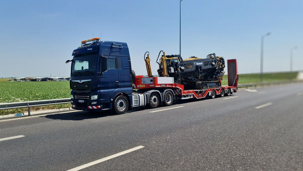 Transport utilaje,marfa trailer agabaritic