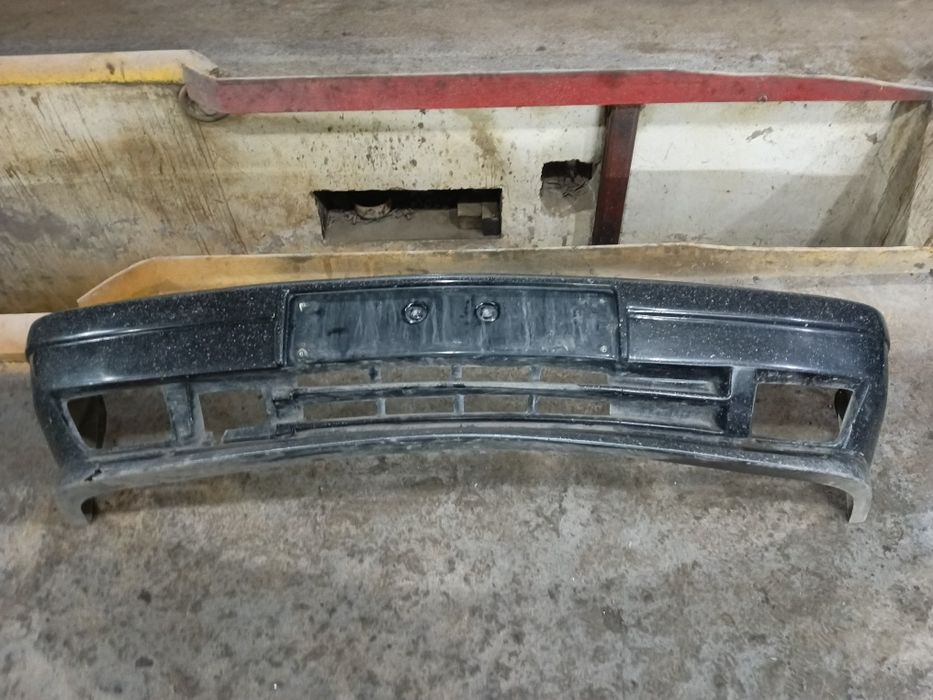 Передний бампер е34