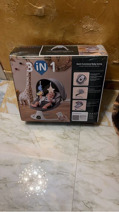 Детский шезлонг. Серого цвета до 14 кг.