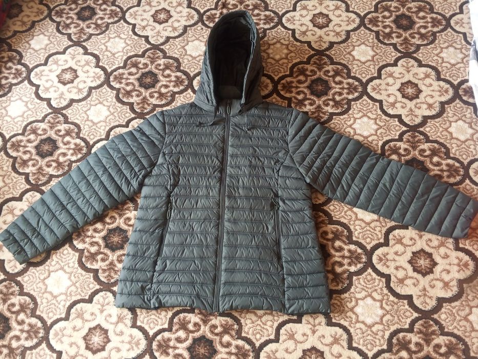 Куртка Сотилади холати янги