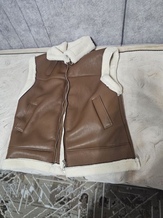 Продам  безрукавку новую