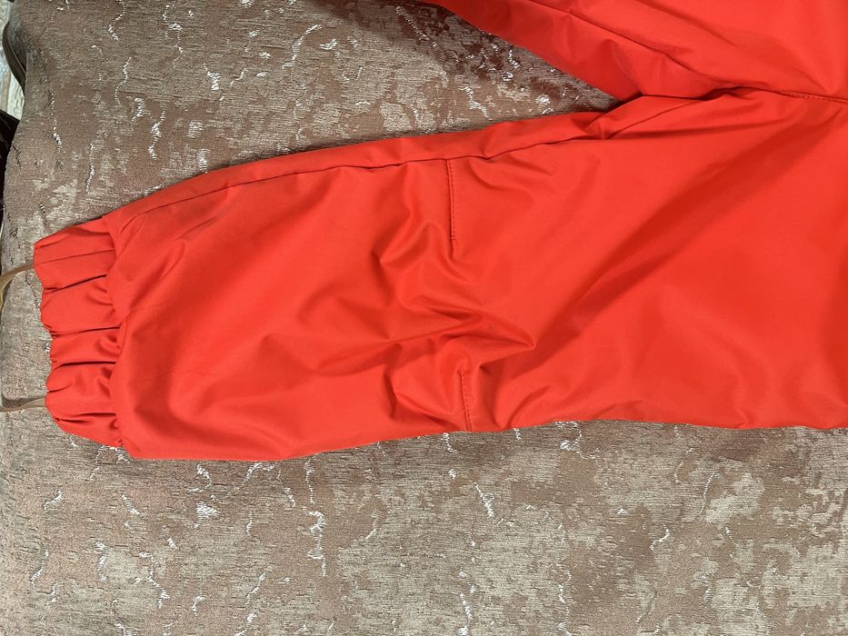 Продам осенний комбинизон.