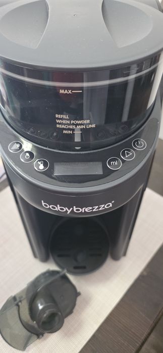 Babybrezza уред за мляко