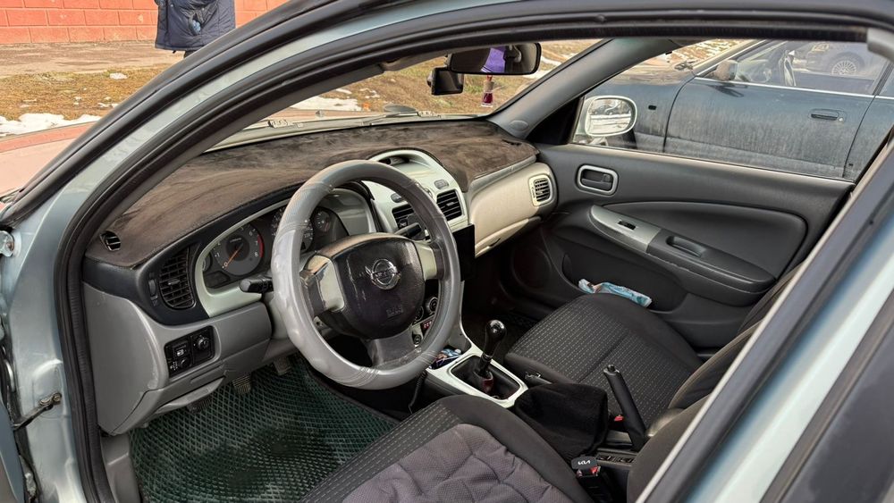 Машина ниссан алмера класик