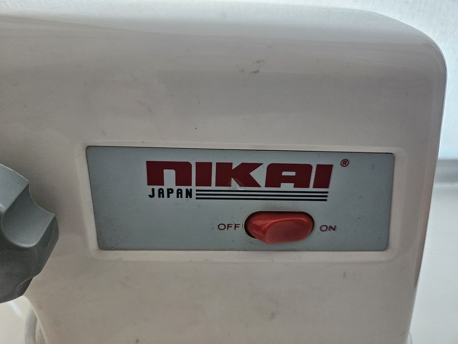 Продам электромясорубку  NIKAI NMC-743