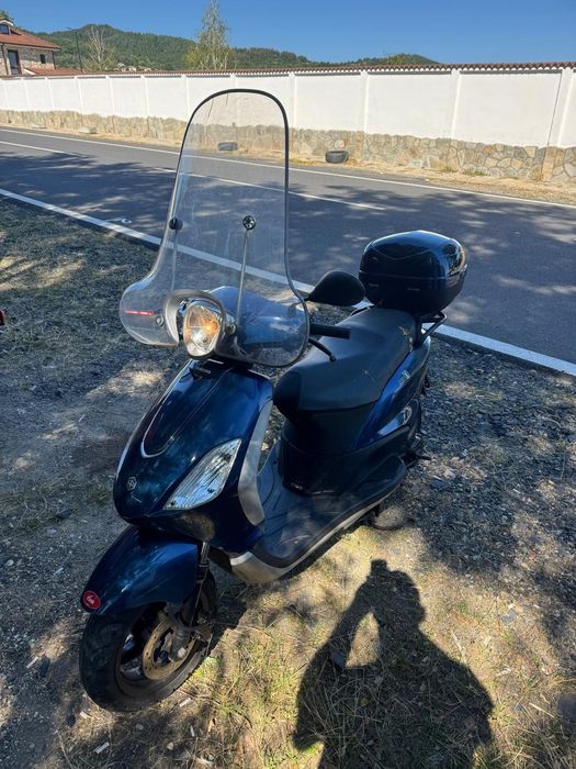 Piagio fly скутер