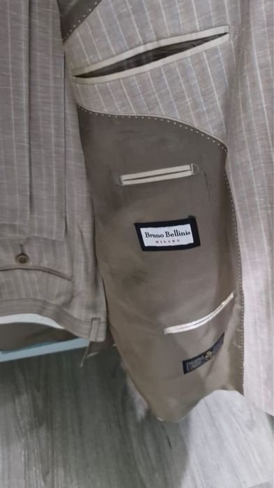 Костюм новый продам