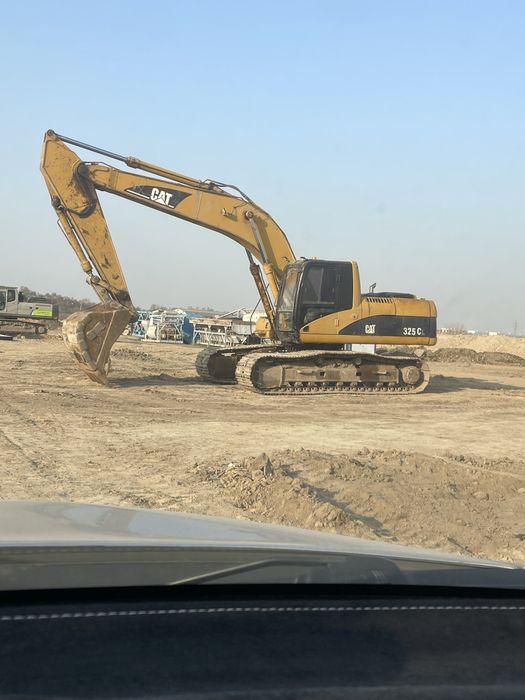 Услуги колесного экскаватора Алматы