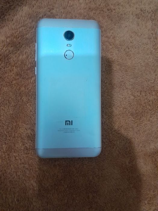 Redmi  5 bir oy kafolati bilan