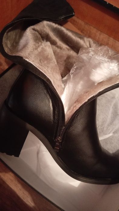 Продам новые сапоги