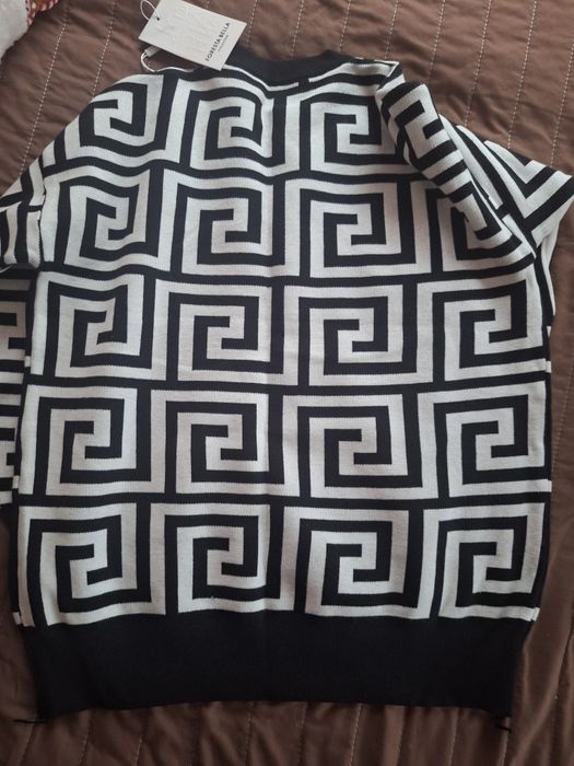 Дамски пуловер нов за 25лв