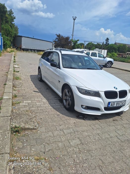 vând BMW e91 x drive