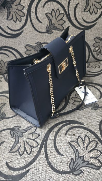 Geanta DKNY și Polo Ralph Lauren