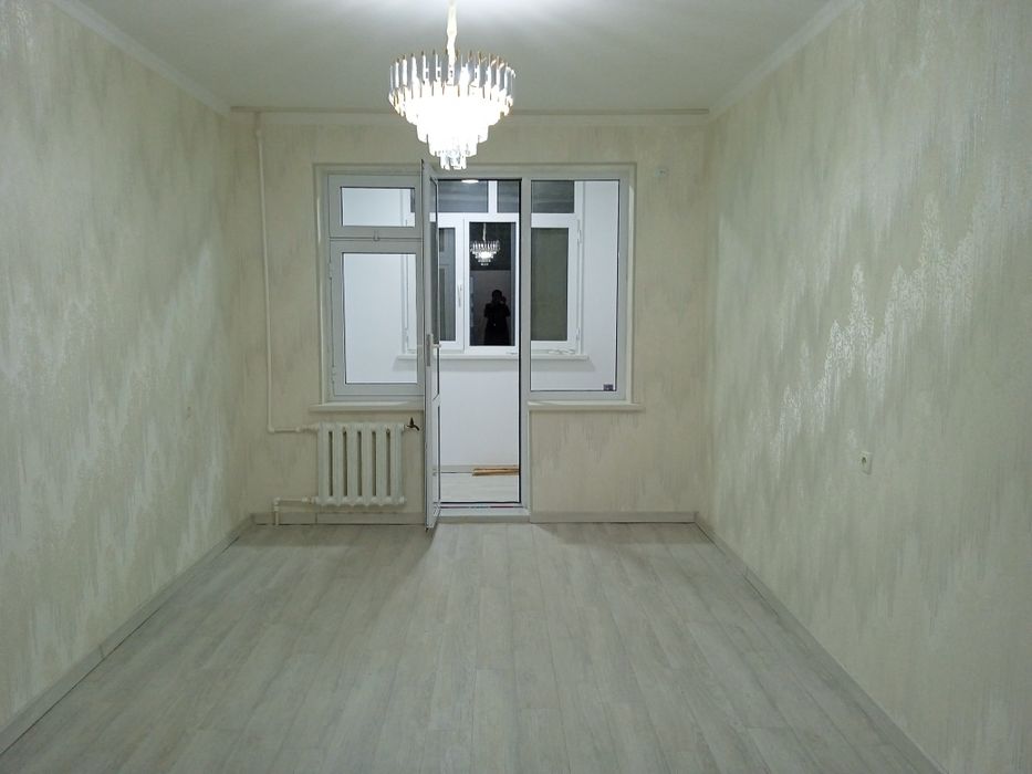 Квартира янги ремонтдан чикган локацияси зур миллий банк ёнида юл усти