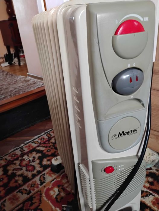 Vând calorifer electric