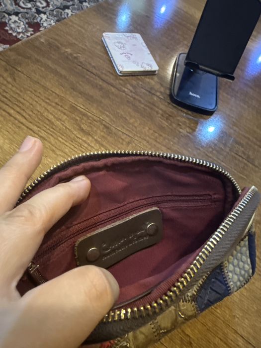 Женский клатч сотилади