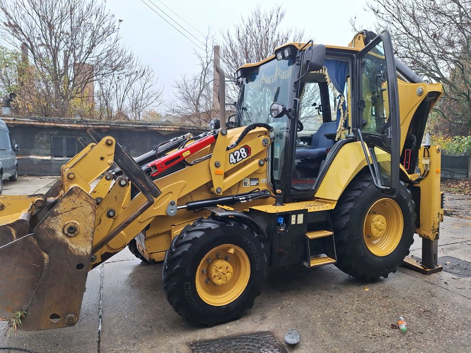 Vand buldoexcavator cat 428