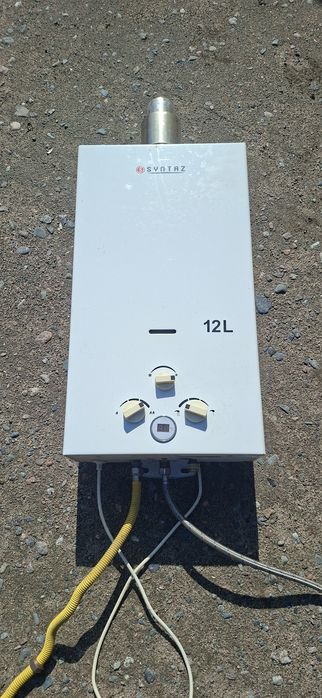 Продам газовую печь для горячей воды