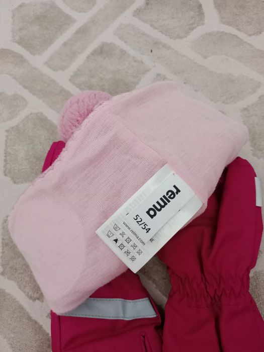 Продам шапку Reima