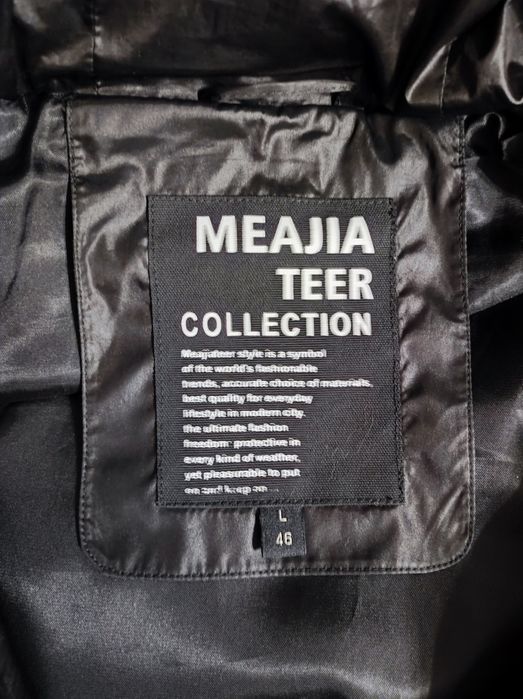 Зимний пуховик продам