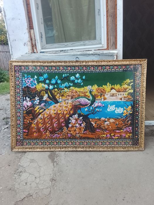 Carpeta tablou cu paun cu o vechime de 80 de ani