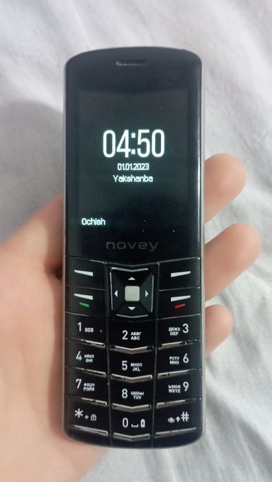 Novey Aura V1 knopka telefon