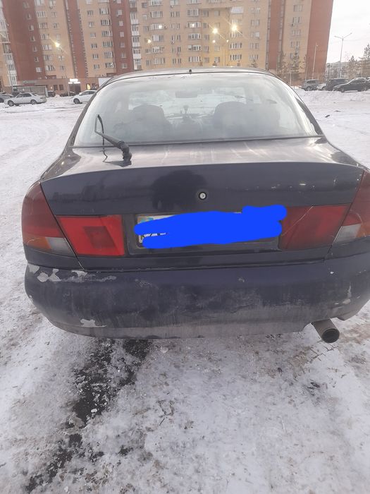 Мицубиси Каризма