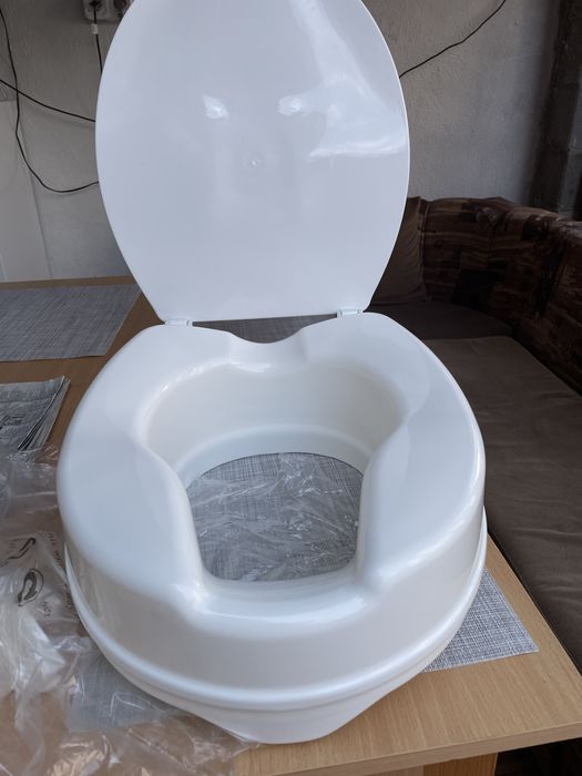 Повдигаща седалка за тоалетна чиния