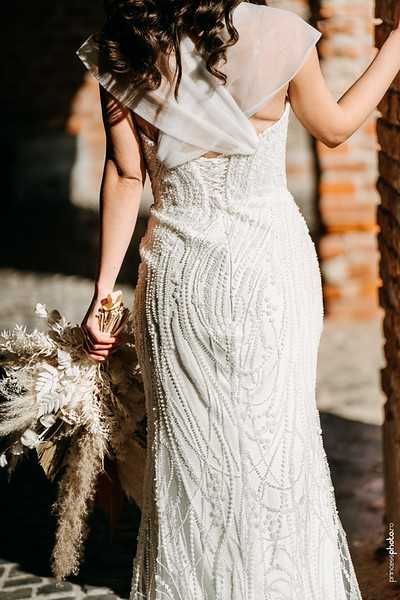Vând Rochie de mireasă (nouă-purtată o singură dată,curatată chimic)