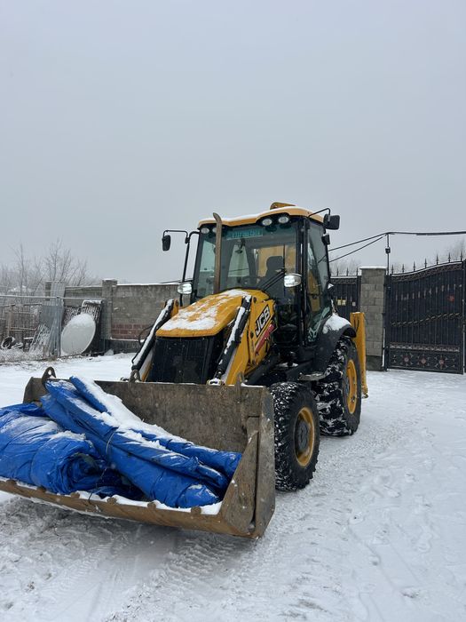 Экскаватор -Погрузчик триводном  3/1