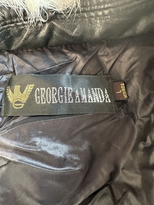 Продам женский пуховик