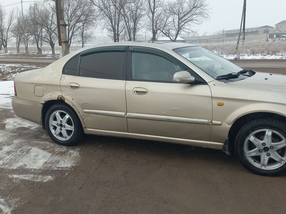 Машина деу магнус