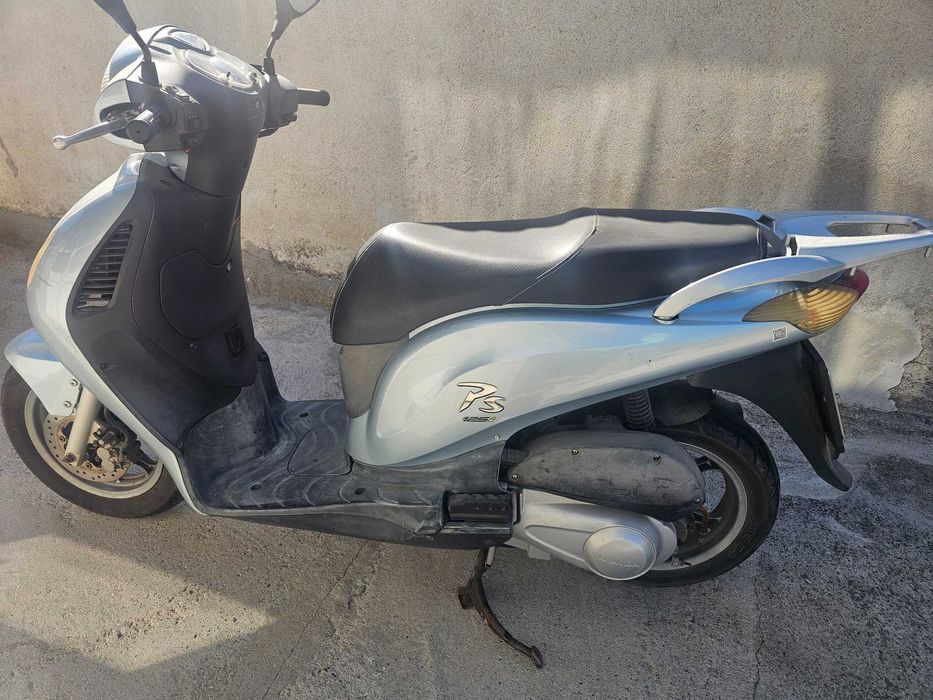 Скутер  Хонда 125i