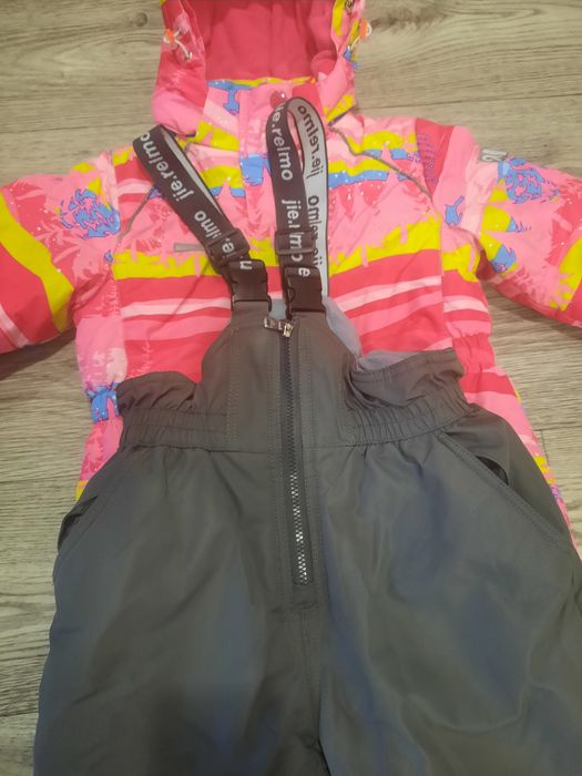 Продам тёплый комбенезон на девочку роставка 128 см.