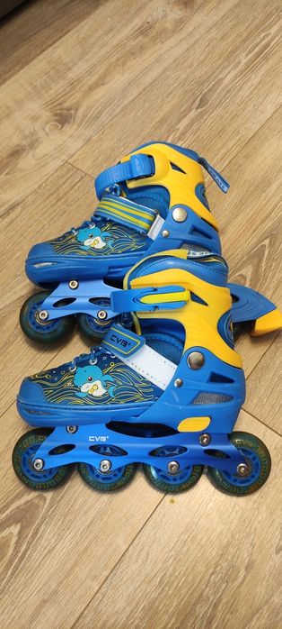 Роликовые коньки