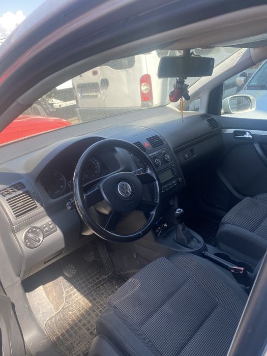 На части VW Touran 2.0