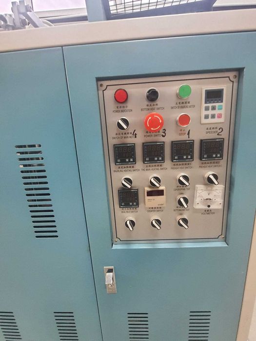 Masina automata de produs pahare din carton, a functionat doar pentru probe