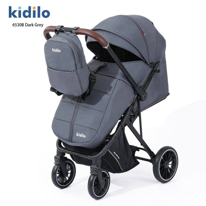 Коляска чемодан с перекидными ручками легко складывается Коляска в сам