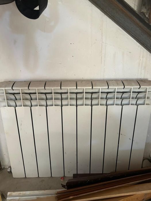 Продам печь , трубу и батареии