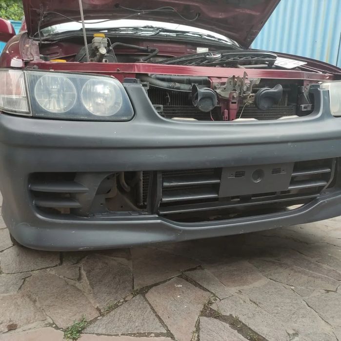 Передний бампер nissan r'nessa