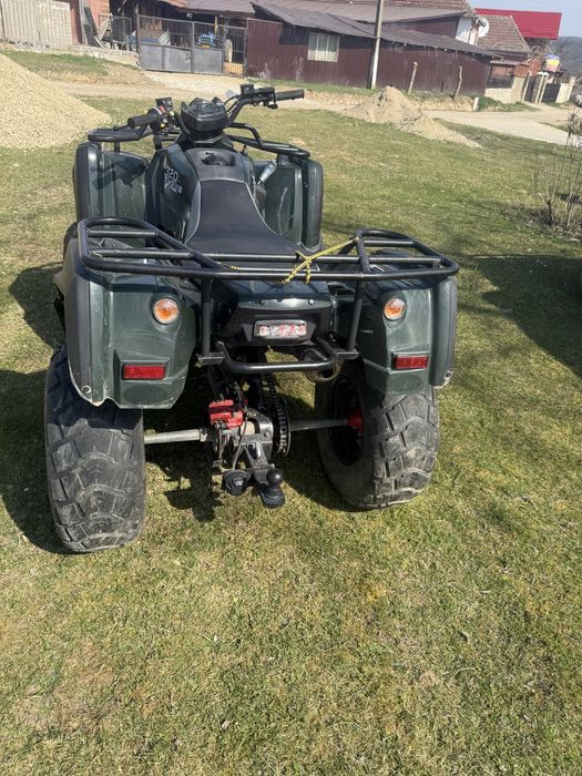 Atv 320 adly nr negre și Suzuki Vitara 1.6 i