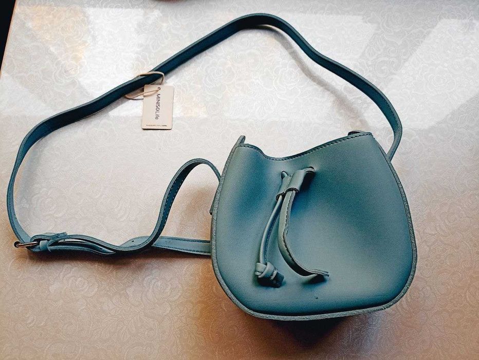 Абсолютно новая, изящная сумочка бренда Miniso, из экокожи