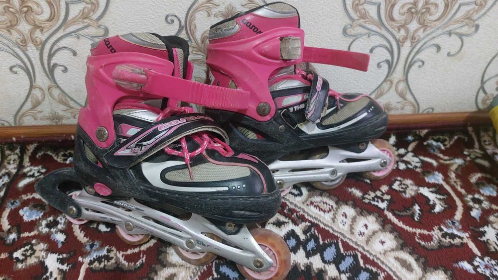 Роликовые коньки