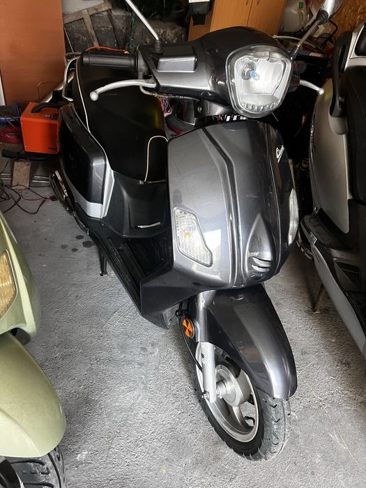 SCUTERE  49 și 125cc Yamaha Kymko